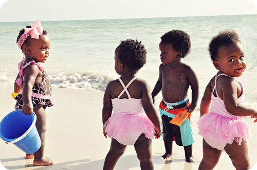 black babies on beach