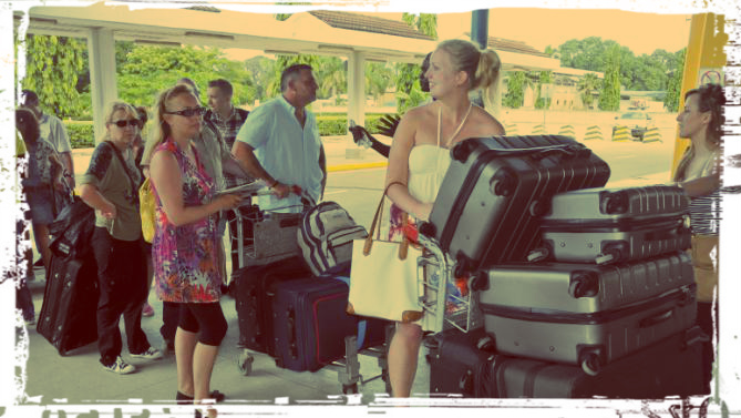 overpacking lots of luggage island travel