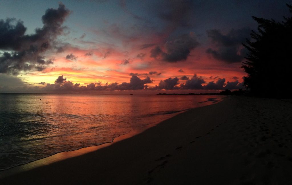 sunset seven mile beach Grand Cayman islands beach